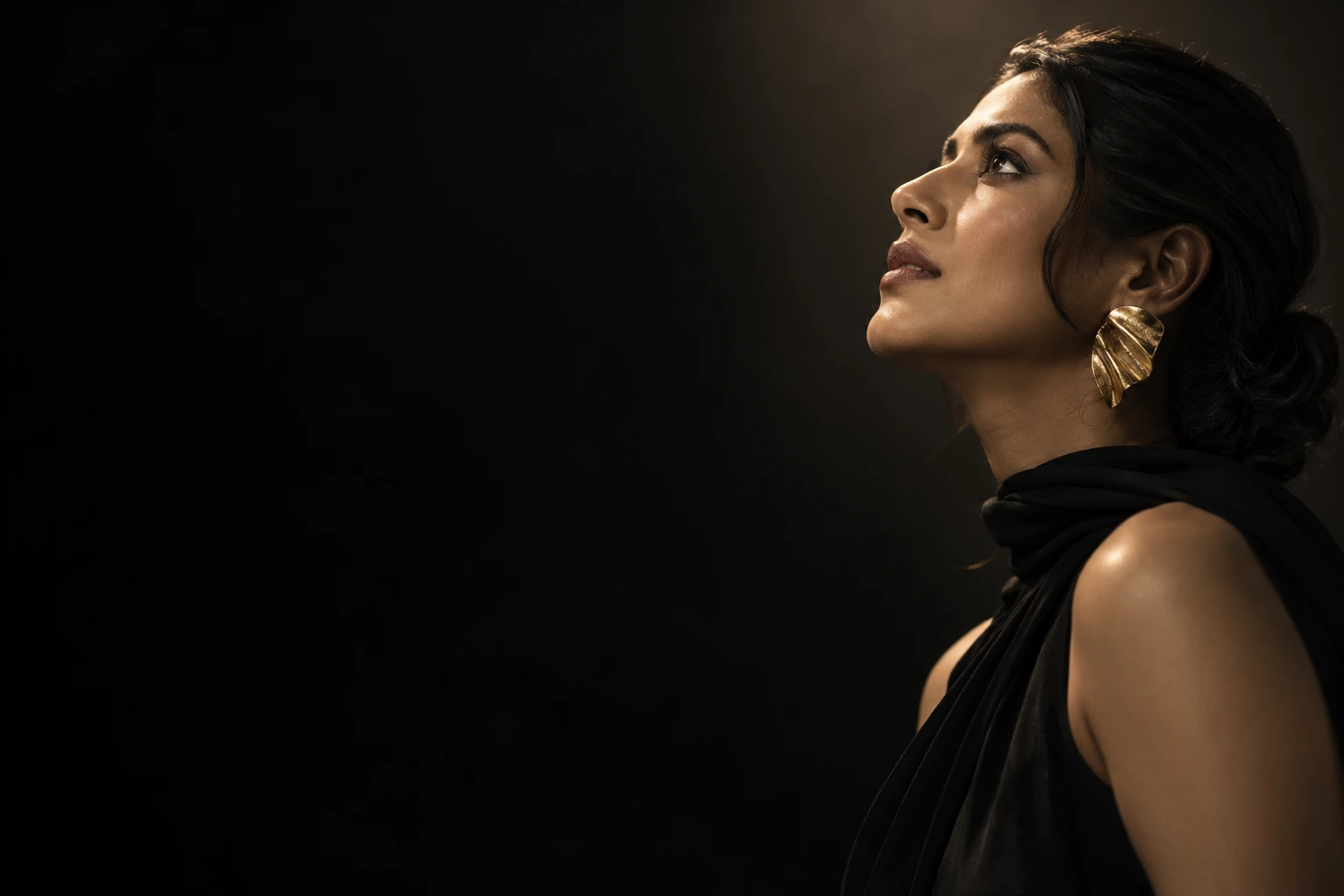 Sculptural fashion portrait with a statement earring